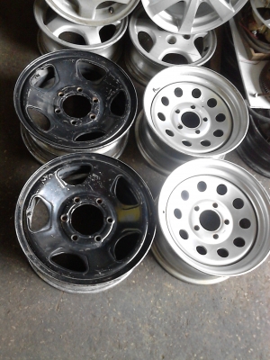 กะทะผ่า 5 รู ขอบ 14  ใส่เพื่อขยายยาง ให้ยื่นออกไปขอบนอก   มี 2 ใบ   Tel.081-427-3945