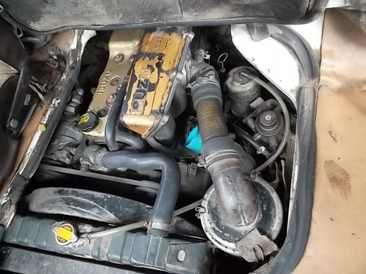 ตู้ ISUZU รุ่นรถ: BUDDY โฉมรถ: สีรถ: ขาว ระบบเกียร์: ธรรมดา / manual ขนาดเครื่อง/CC: 2,500 CC