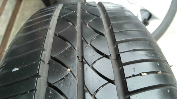 ล้อถอดป้ายแดง nisssn march ขอบ14 4รู100  ยาง 165 70 14