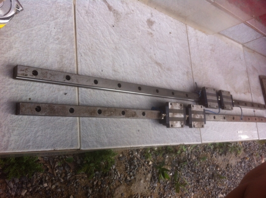 ชุดลูกกลิ้งรางสไลด์ถอดจากเครื่องCNC ขนาดกว้าง 21 มม. ยาว 100. ซม(เหลือ 2 ชุด)