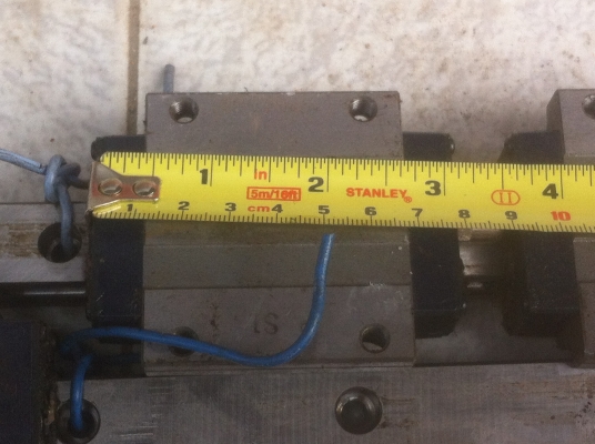 ชุดลูกกลิ้งรางสไลด์ถอดจากเครื่องCNC ขนาดกว้าง 21 มม. ยาว 100. ซม(เหลือ 2 ชุด)
