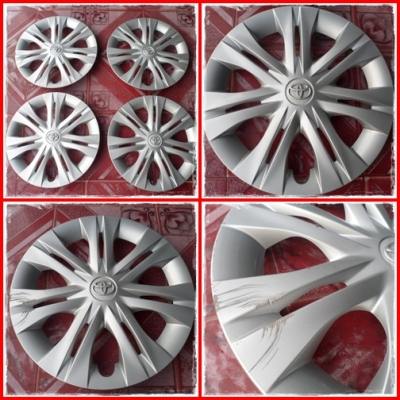 ฝาครอบกระทะเหล็ก toyotaขอบ15"(มีรอยอยู่ฝาเด๋วตามในรูป) มี1ชุด(4ชิ้น) ขาย400บ.