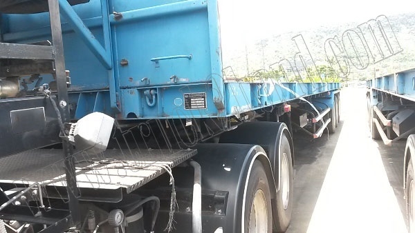 หางพ่วงเทเลอร์พื้นเรียบ12ล้อ 3เพลา ของบริษัทสามมิตร ปี53