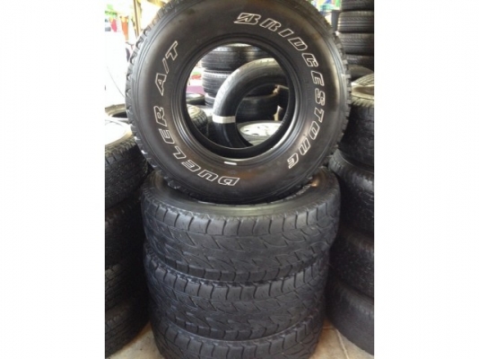 ยางบริดโสตน Bridgestone ขอบขาว 265-75-16