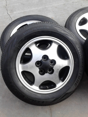 แม๊ก TOYOTA  รถเก๋ง 5 รู  พร้อมยาง BRIDGESTONE  185/65R14  ชุด 4 ล้อ TEL.081-427-3941