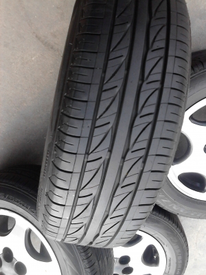แม๊ก TOYOTA  รถเก๋ง 5 รู  พร้อมยาง BRIDGESTONE  185/65R14  ชุด 4 ล้อ TEL.081-427-3941