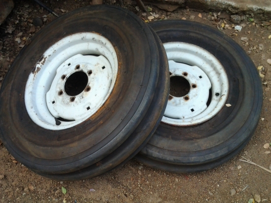 ขายยางหน้ารถไถฟอดขอบ16ดอกเต็มพร้อมกะทะยางนอกแท้