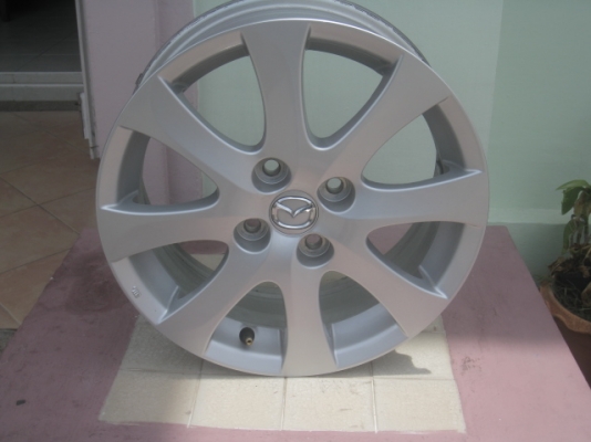 ขายล้อแม็กป้ายแดง mazda 2 15"x6" สนใจติดต่อเล็กคลองสามครับ 081-3747940