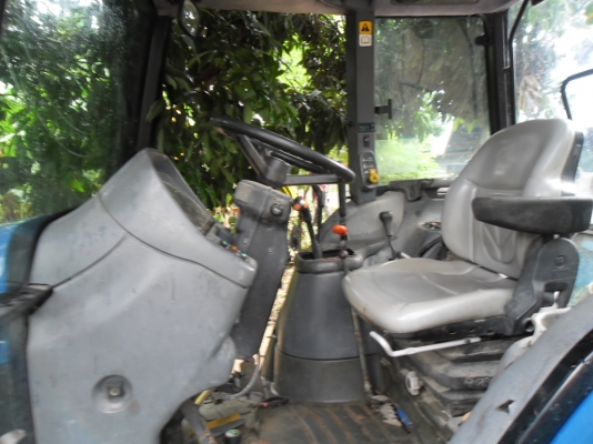 ขายรถไถ FORD NEWHOLLAND TS100 -2 เพลาเอกสารพร้อม ขายรถไถ FORD NEWHOLLAND TS100 -2 เพลาเอกสารพร้อม