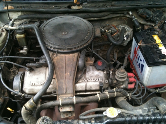 มาสด้าเก๋ง LPG ขับได้ปกติ ทะเบียน มี.ค.58 พร้อมโอน ขาย 19,000 บาท