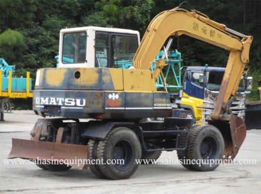 รถขุดล้อยาง PW60-3 S/N 023XX ขำเข้า บจก.สหสินอีควิปเม้นท์ โทร.081-5851880, 02-5168100-1 WWW.SAHASINEQUIPMENT.COM