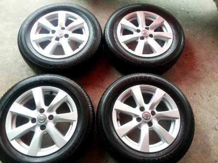 ล้อ Nissan Almela ขอบ15พร้อมยาง ปี12