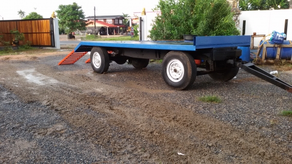 ขายเทเลอร์ลากอุปกรณ์การเกรษต รถเกียวคูโบต้าขึ้นสบายระบบล้อหน้าเลียวตามไม่หนักรถลาก