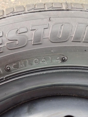 ยาง ถอดป้ายแดง Bridgestone 175-65-15 ปี 14 พร้อมกะทะ 4 วง