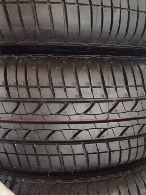 ยางถอดป้ายแดง Bridgestone 175-65-15 ปี 13 พร้อมกะทะ 4 วง