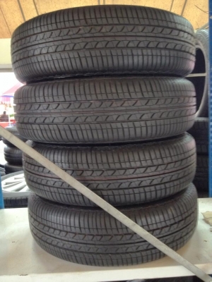 ยางถอดป้ายแดง Bridgestone 175-65-15 ปี 13 พร้อมกะทะ 4 วง