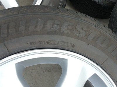 ขายล้อแม็กISUZU GOLD seriesขอบ16 พร้อมยาง215/65/16 ปี 13 4 ล้อ