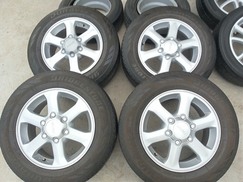 ขายล้อแม็กISUZU GOLD seriesขอบ16 พร้อมยาง215/65/16 ปี 13 4 ล้อ