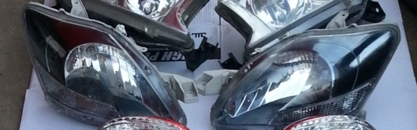 โคมไฟหน้า วีออส Smoke chome แท้โรงงาน