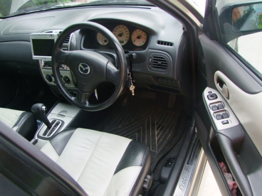 MAZDA 323 Protege ปี 2004 Auto เครื่องแน่นๆไม่เยิ้ม ช่วงล่างหนึบๆ มือสองแท้ ชุดแต่งรอบคันโรงงาน แมกซ์ขอบ 15 นิ้ว โรงงาน มี abs airbag 2 ลูก รีโมท เบาะหนัง กระจกไฟฟ้า ปรับข้างไฟฟ้า