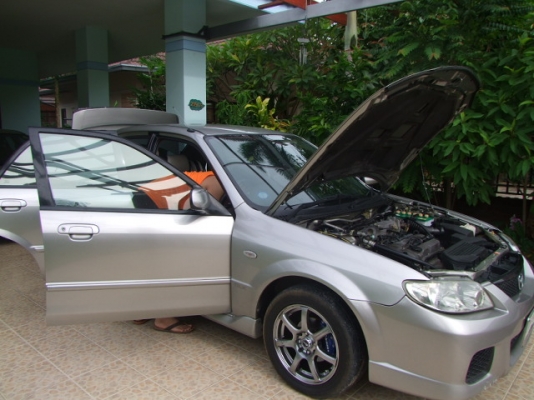 MAZDA 323 Protege ปี 2004 Auto เครื่องแน่นๆไม่เยิ้ม ช่วงล่างหนึบๆ มือสองแท้ ชุดแต่งรอบคันโรงงาน แมกซ์ขอบ 15 นิ้ว โรงงาน มี abs airbag 2 ลูก รีโมท เบาะหนัง กระจกไฟฟ้า ปรับข้างไฟฟ้า