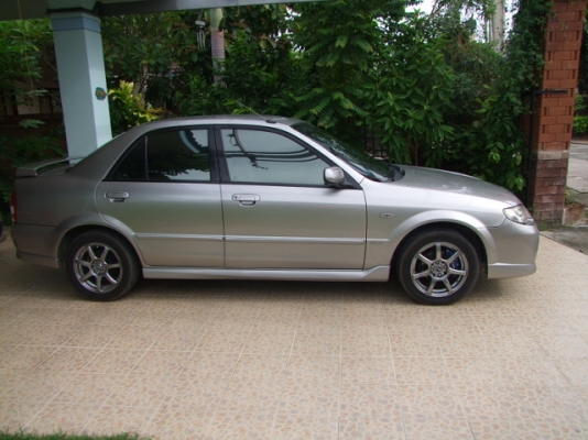 MAZDA 323 Protege ปี 2004 Auto เครื่องแน่นๆไม่เยิ้ม ช่วงล่างหนึบๆ มือสองแท้ ชุดแต่งรอบคันโรงงาน แมกซ์ขอบ 15 นิ้ว โรงงาน มี abs airbag 2 ลูก รีโมท เบาะหนัง กระจกไฟฟ้า ปรับข้างไฟฟ้า