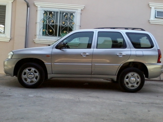 ขาย MAZDA ทริบิว/ 04-06/2.0