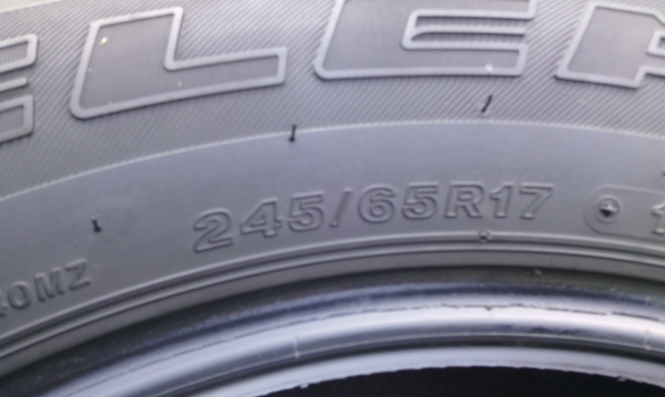 ขายยางbridgestone dueler 245/65r17ปี11สภาพดีครับถอดจากปาเจโร่4เส้นครับ