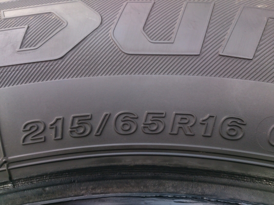 ขายยาง215/65R16 BRIDCESTONE DURAVIS ยางสัปดาห์ที่34ปี13 ดอกยางนิ่มลึกเท่ากันไม่ร้าวไม่แตกลาย(สภาพยาง90\%) จำนวน 1 ชุด