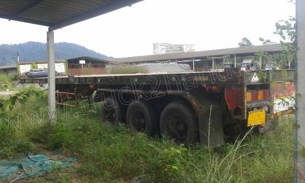 หางพ่วงเทเลอร์พื้นเรียบ 3 เพลา ต่ออู่ ส.สุชัย ยาว 12.40 แบบสามเพลาแท้