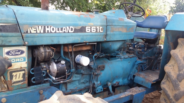 ขายรถไถฟอร์ด 6610 2 เพลา คานหน้าคาราโร่ พร้อมอุปกรณ์ดันหน้า พร้อมทะเบียน