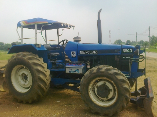 ขายรถไถFORD รุ่น6640สองเพลาคานหน้าคาลาโล่มีทะเบียนสนใจ0810076640