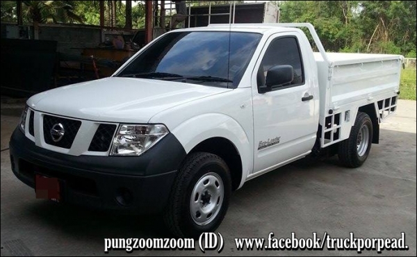 นิสสัน นาวาร่า สีขาวป้ายแดง กระบะเหล็กลอยพื้นเรียบ หนา2.2 มิล แผงข้างเปิดได้ 3 ด้านความสูงของแผงข้างและแผงท้าย 50 ซ.คับ