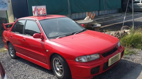 ขายรถมิสซูบิชิ แลนด์เซอร์ อีคาร์ สีแดง ขายรถมิสซูบิชิ แลนด์เซอร์ อีคาร์ สีแดง