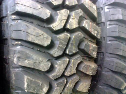 ยางมัดใหม่ขอบ16ดีสโตนผ้าใบ10ชั้นสำหรับรถบรรทุกหนักแบบลุย