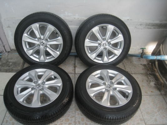ขายล้อแม็กป้ายแดง Honda jazz 15" พร้อมยางปี13 สนใจติดต่อเล็กคลองสามครับ 081-3747940