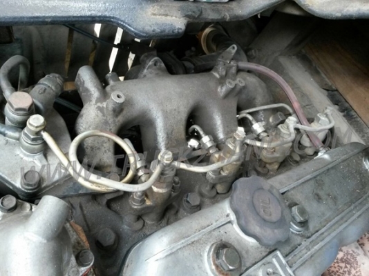 รถบรรทุก 6 ล้อ ยี่ห้ออีซูซุ เป็นกระบะไม้+หัวไม้