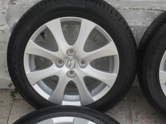 ขายล้อแม็กป้ายแดง mazda 2 15" พร้อมยางปี13 สนใจติดต่อเล็กคลองสามครับ 081-3747940