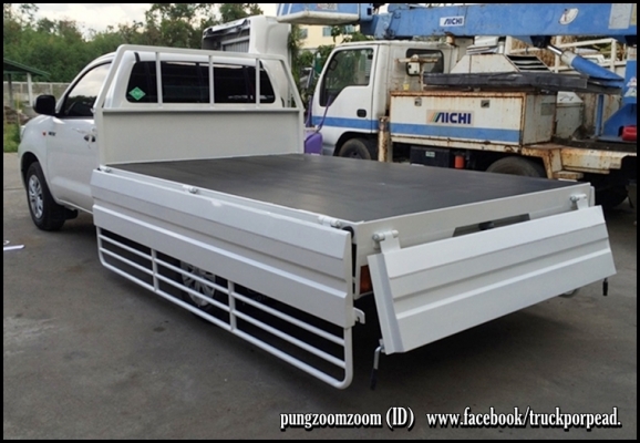 วีโก้ ทำกระบะเหล็กยาว 2.65ม. กว้าง 1.76 ม.วัดในพร้อมชายล่าง เปิดแผงข้างได้มีคอกเหล็กสูงจากพื้น ประมาณ 30-40 ซ