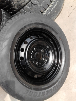 ล้อกะทะ 5 รู แบบ TOYOTA พร้อมยาง ขอบ 15  มี 1 ล้อ  TEL.081-427-3941