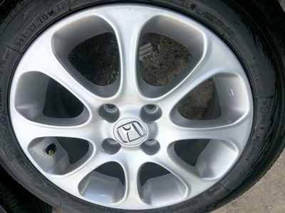 ขายล้อแม็กHONDA JAZZขอบ15 พร้อมยางปี12   4  เส้น