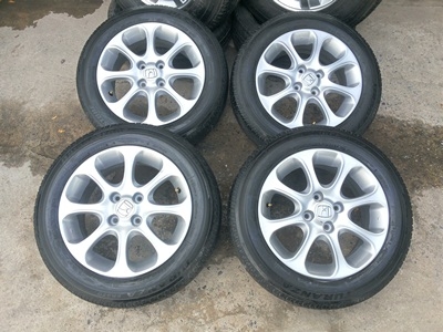 ขายล้อแม็กHONDA JAZZขอบ15 พร้อมยางปี12   4  เส้น