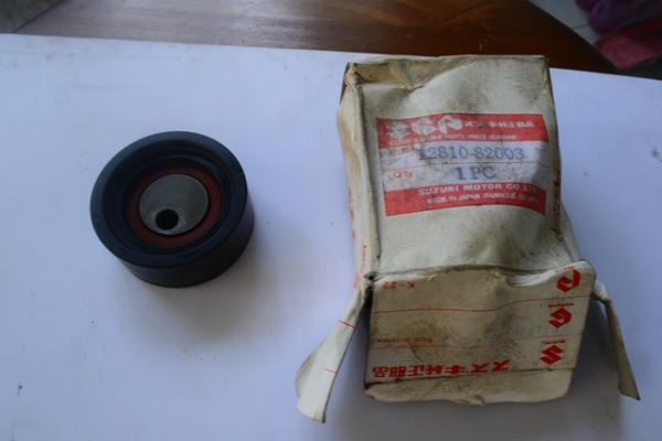 ลูกรอกสายพานราวลิ้น ซูซูกิ คาริเบียน SJ413 แท้ติดรถ