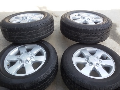 ขายล้อแม็กISUZU GOLD series16 พร้อมยางปี225/65/16ปี12  4 ล้อ