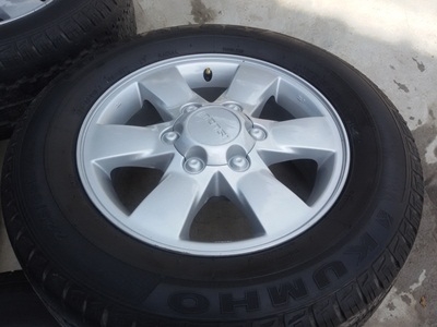 ขายล้อแม็กISUZU GOLD series16 พร้อมยางปี225/65/16ปี12  4 ล้อ