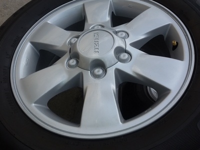 ขายล้อแม็กISUZU GOLD series16 พร้อมยางปี225/65/16ปี12  4 ล้อ