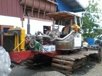 รถปั่นดินสามชุกการช่าง