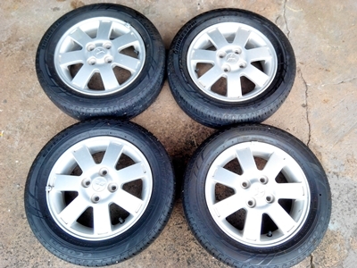 แม็กเดิมมิราจ ขอบ14 พร้อมยางบริดโตน ปี13 ล้อสวยวิ้ง