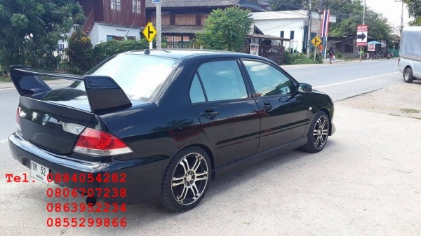 ขาย Mitsubishi New Lancer สีดำสวยมาก ชุดแต่งรอบคัน ราคา 195,000 บาท +++++