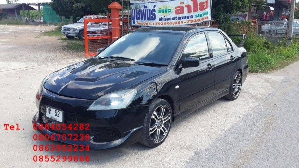 ขาย Mitsubishi New Lancer สีดำสวยมาก ชุดแต่งรอบคัน ราคา 195,000 บาท +++++